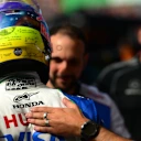 ZANDVOORT, NETHERLANDS - AUGUST 30: Fourth placed qualifier Isack Hadjar of France and Visa Cash App Racing Bulls is congratulated by teammates in parc ferme during qualifying ahead of the F1 Grand Prix of Netherlands at Circuit Zandvoort on August 30, 2025 in Zandvoort, Netherlands. (Photo by Mario Renzi - Formula 1/Formula 1 via Getty Images)