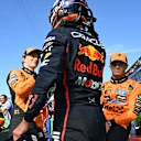 ZANDVOORT, NETHERLANDS - AUGUST 30: Pole position qualifier Oscar Piastri of Australia and McLaren Second placed qualifier Lando Norris of Great Britain and McLaren and Third placed qualifier Max Verstappen of the Netherlands and Oracle Red Bull Racing congratulate each other in parc ferme during qualifying ahead of the F1 Grand Prix of Netherlands at Circuit Zandvoort on August 30, 2025 in Zandvoort, Netherlands. (Photo by Mark Sutton - Formula 1/Formula 1 via Getty Images)