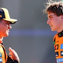 ZANDVOORT, NETHERLANDS - AUGUST 30: Pole position qualifier Oscar Piastri of Australia and McLaren and Second placed qualifier Lando Norris of Great Britain and McLaren talk in parc ferme during qualifying ahead of the F1 Grand Prix of Netherlands at Circuit Zandvoort on August 30, 2025 in Zandvoort, Netherlands. (Photo by Joe Portlock/Getty Images)