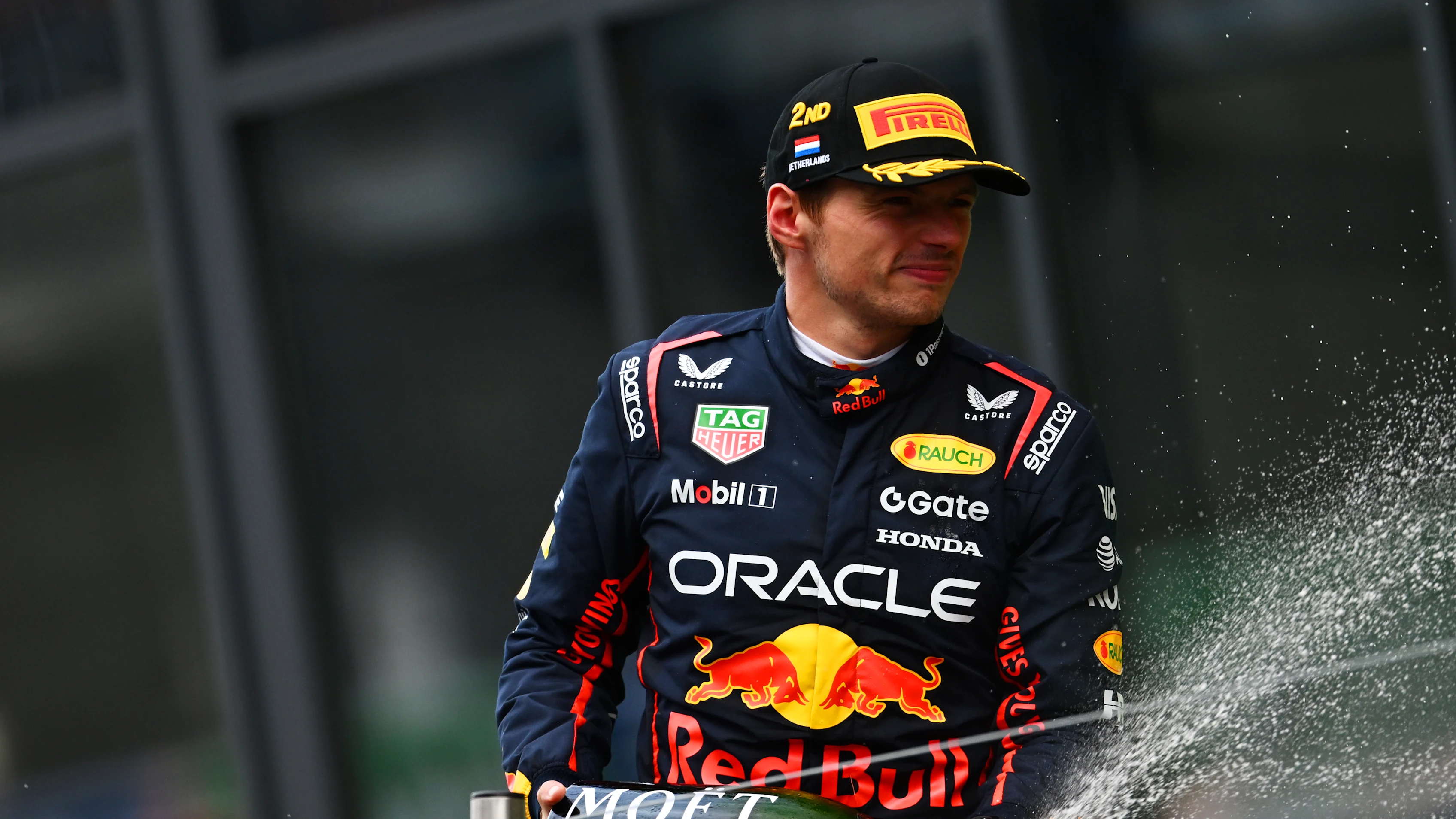 ZANDVOORT, NETHERLANDS - AUGUST 31: Second placed Max Verstappen of the Netherlands and Oracle Red Bull Racing celebrates on the podium during the F1 Grand Prix of Netherlands at Circuit Zandvoort on August 31, 2025 in Zandvoort, Netherlands. (Photo by James Sutton/Getty Images)