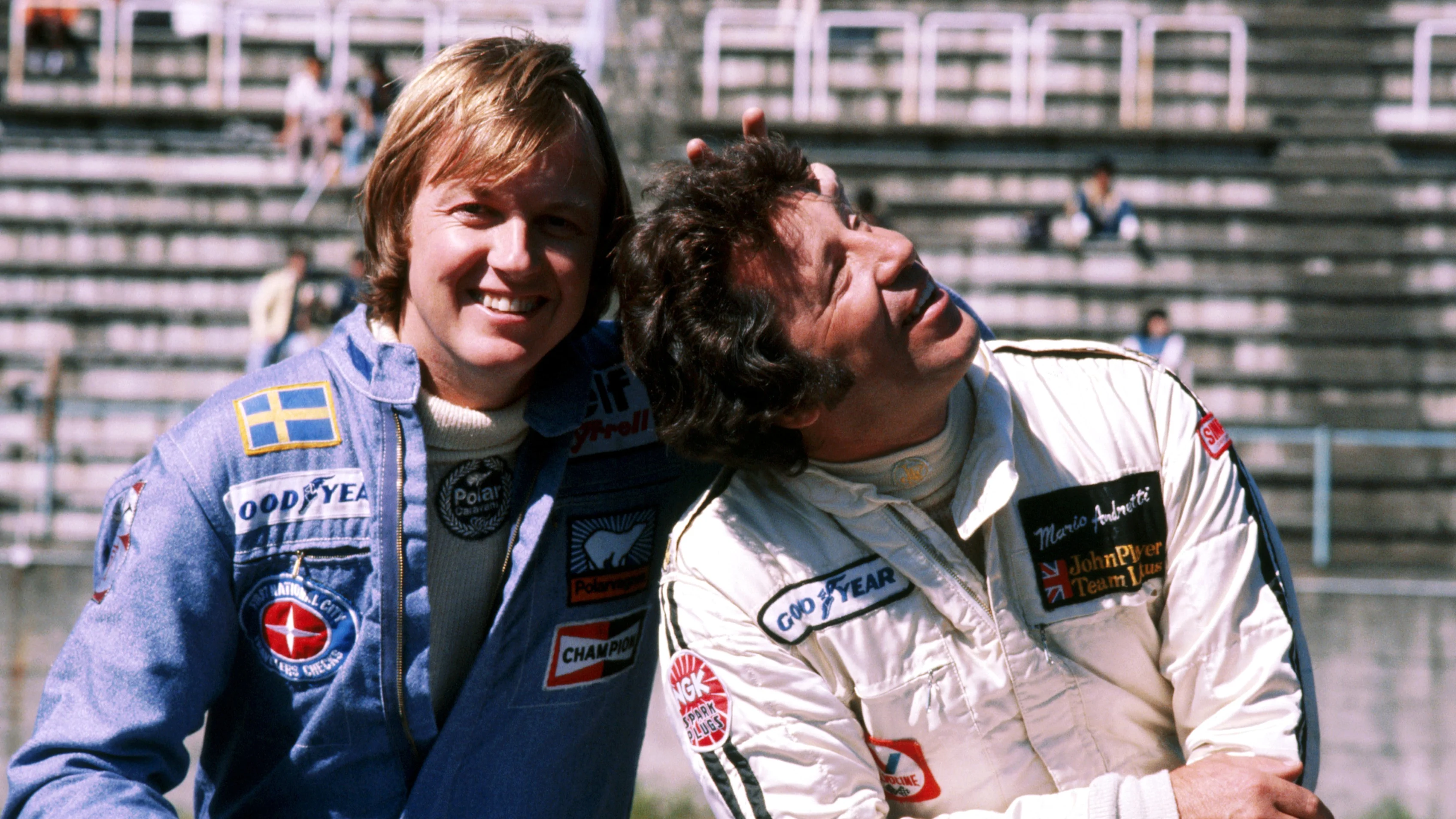 (L to R): Ronnie Peterson (SWE) Tyrrell, who was involved in a serious accident on lap 6, poses on