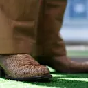 Il n'a jamais manqué un moment de style à Austin, se pavanant dans le paddock avec des bottes en peau de serpent.