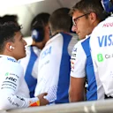 MONZA, ITALY - SEPTEMBER 06: Isack Hadjar of France and Visa Cash App Racing Bulls talks with Pierre Hamelin, Race Engineer of Visa Cash App Racing Bulls on the pit wall during qualifying ahead of the F1 Grand Prix of Italy at Autodromo Nazionale Monza on September 06, 2025 in Monza, Italy. (Photo by Bryn Lennon - Formula 1/Formula 1 via Getty Images)