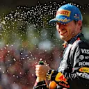 MONZA, ITALY - SEPTEMBER 07: Race winner Max Verstappen of the Netherlands and Oracle Red Bull Racing celebrates with Champagne on the podium during the F1 Grand Prix of Italy at Autodromo Nazionale Monza on September 07, 2025 in Monza, Italy. (Photo by Bryn Lennon - Formula 1/Formula 1 via Getty Images)