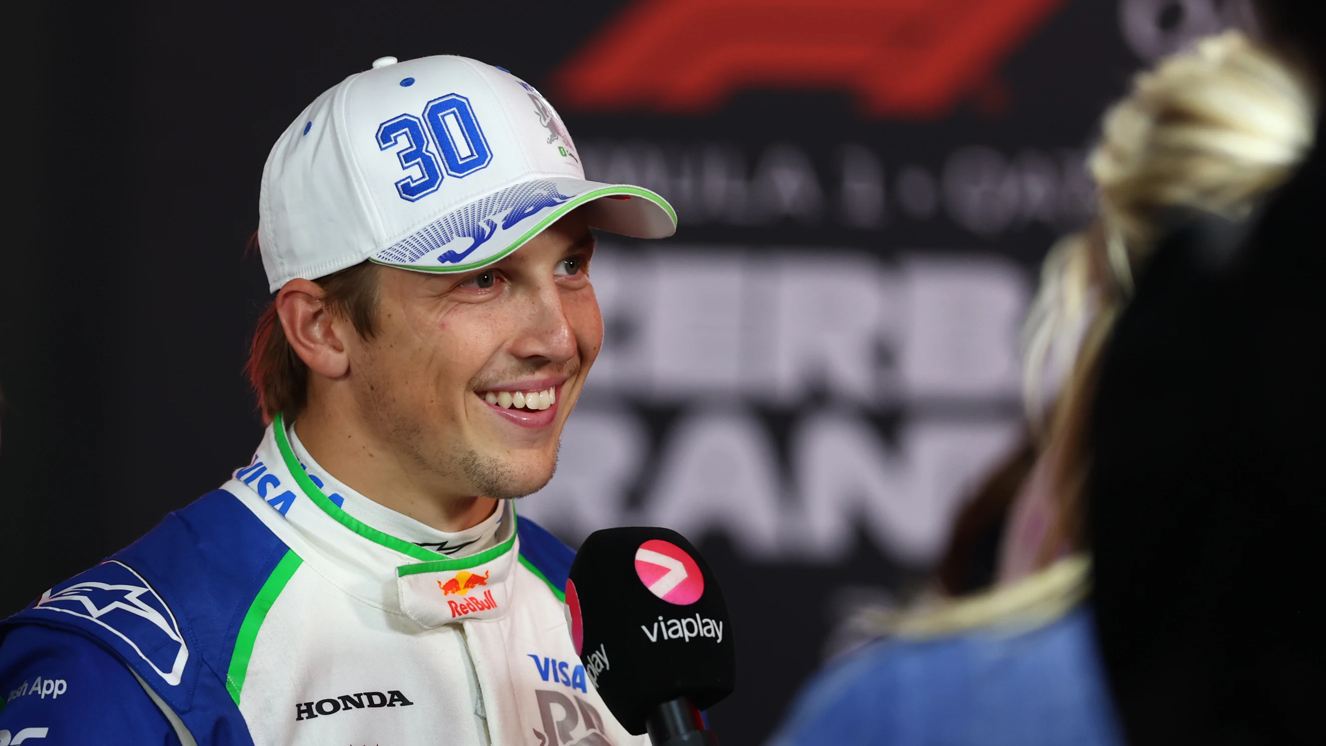 BAKU, AZERBAIJAN - SEPTEMBER 20: Liam Lawson of New Zealand and Visa Cash App Racing Bulls VCARB talks to the media during qualifying ahead of the F1 Grand Prix of Azerbaijan at Baku City Circuit on September 20, 2025 in Baku, Azerbaijan. (Photo by Peter Fox/Getty Images)