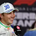 BAKU, AZERBAIJAN - SEPTEMBER 20: Liam Lawson of New Zealand and Visa Cash App Racing Bulls VCARB talks to the media during qualifying ahead of the F1 Grand Prix of Azerbaijan at Baku City Circuit on September 20, 2025 in Baku, Azerbaijan. (Photo by Peter Fox/Getty Images)