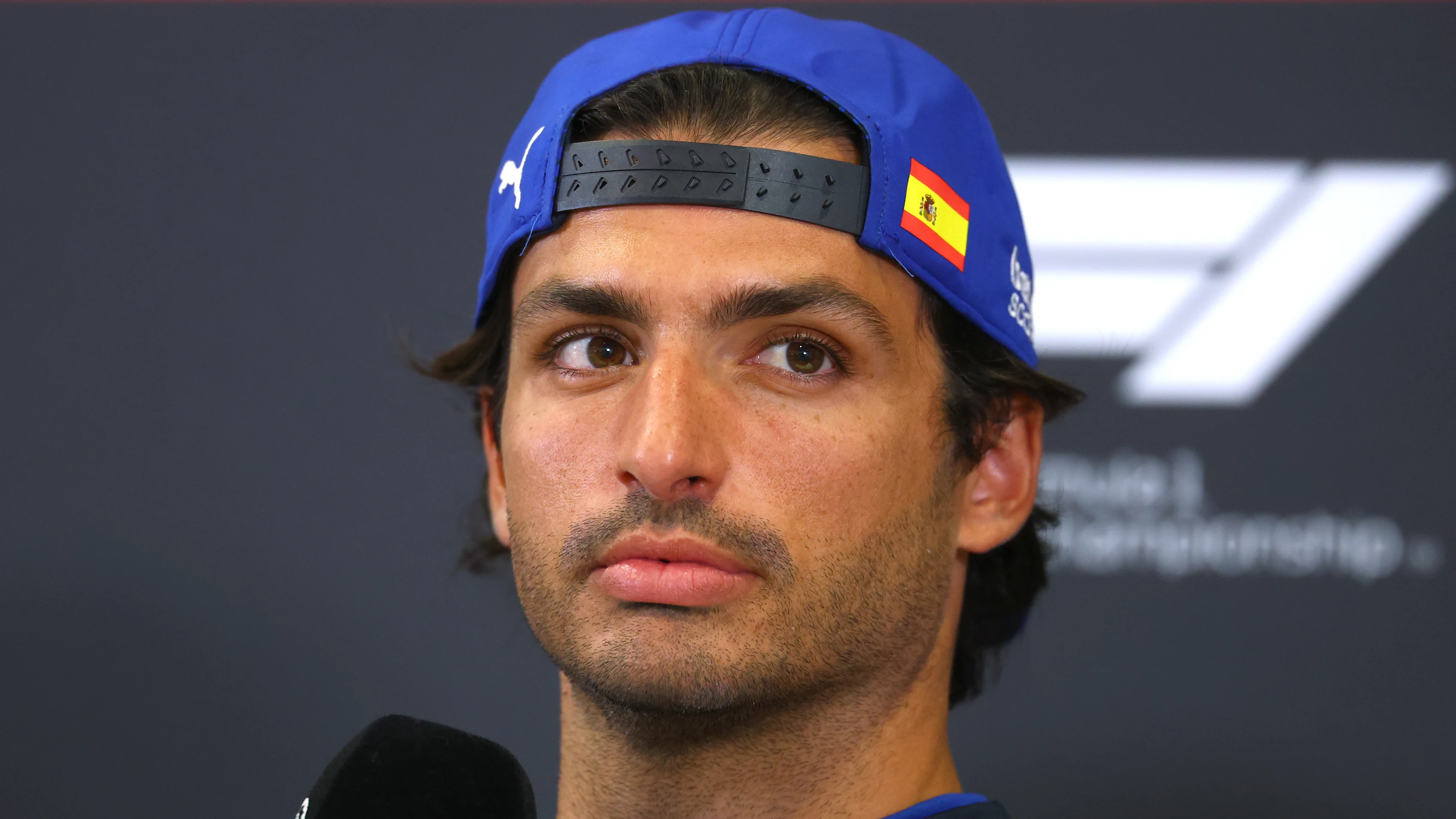 MONZA, ITALY - SEPTEMBER 04: Carlos Sainz of Spain and Williams speaks in the Drivers Press Conference during previews ahead of the F1 Grand Prix of Italy at Autodromo Nazionale Monza on September 04, 2025 in Monza, Italy. (Photo by Clive Rose/Getty Images)