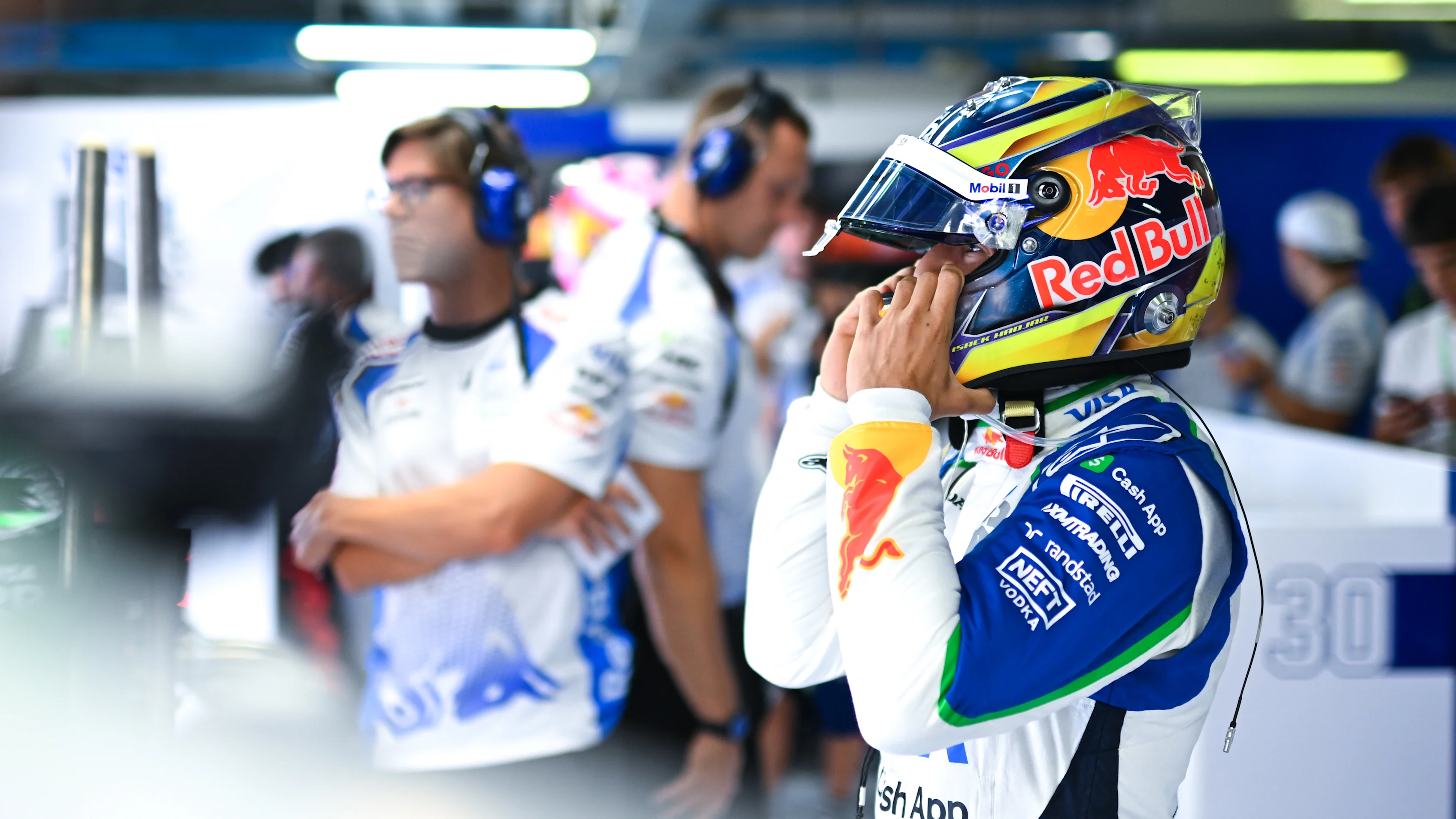 MONZA, ITALY - SEPTEMBER 05: Isack Hadjar of France and Visa Cash App Racing Bulls prepares to drive in the garage during practice ahead of the F1 Grand Prix of Italy at Autodromo Nazionale Monza on September 05, 2025 in Monza, Italy. (Photo by Rudy Carezzevoli/Getty Images)