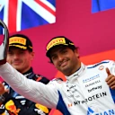 BAKU, AZERBAIJAN - SEPTEMBER 21: Third placed Carlos Sainz of Spain and Williams lifts his trophy on the podium during the F1 Grand Prix of Azerbaijan at Baku City Circuit on September 21, 2025 in Baku, Azerbaijan. (Photo by James Sutton - Formula 1/Formula 1 via Getty Images)