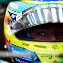 SINGAPORE, SINGAPORE - OCTOBER 04: Fernando Alonso of Spain and Aston Martin F1 Team prepares to drive in the garage prior to final practice ahead of the F1 Grand Prix of Singapore at Marina Bay Street Circuit on October 04, 2025 in Singapore, Singapore. (Photo by Clive Rose - Formula 1/Formula 1 via Getty Images)