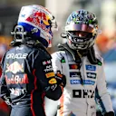 AUSTIN, TEXAS - OCTOBER 17: Sprint Pole qualifier Max Verstappen of the Netherlands and Oracle Red Bull Racing and Sprint 3rd qualifier Oscar Piastri of Australia and McLaren congratulate each other in parc ferme during Sprint Qualifying ahead of the F1 Grand Prix of United States at Circuit of The Americas on October 17, 2025 in Austin, Texas. (Photo by Mark Thompson/Getty Images)