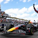 AUSTIN, TEXAS - OCTOBER 18: Sprint winner Max Verstappen of the Netherlands and Oracle Red Bull Racing waves in parc ferme during the Sprint ahead of the F1 Grand Prix of United States at Circuit of The Americas on October 18, 2025 in Austin, Texas. (Photo by Bryn Lennon - Formula 1/Formula 1 via Getty Images)