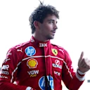 MEXICO CITY, MEXICO - OCTOBER 25: Second placed qualifier Charles Leclerc of Monaco and Scuderia Ferrari gives a thumbs up in parc ferme during qualifying ahead of the F1 Grand Prix of Mexico at Autodromo Hermanos Rodriguez on October 25, 2025 in Mexico City, Mexico. (Photo by Bryn Lennon - Formula 1/Formula 1 via Getty Images)