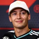 SINGAPORE, SINGAPORE - OCTOBER 02: George Russell of Great Britain and Mercedes AMG Petronas F1 Team looks on in the Drivers Press Conference during previews ahead of the F1 Grand Prix of Singapore at Marina Bay Street Circuit on October 02, 2025 in Singapore, Singapore. (Photo by Clive Rose/Getty Images)