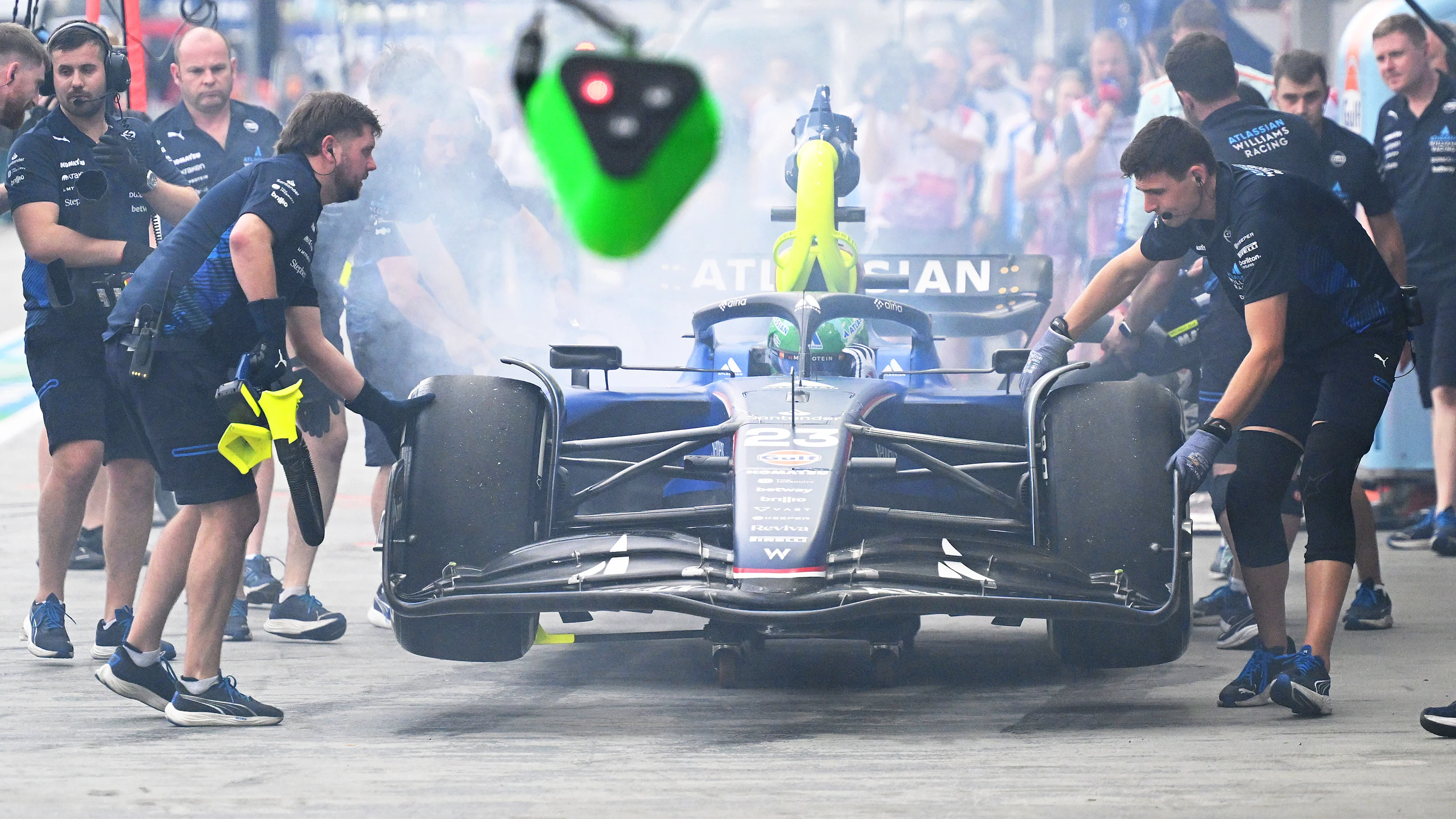 SINGAPORE, SINGAPORE - OCTOBER 03: Alexander Albon of Thailand driving the (23) Williams FW47 Mercedes in the Pitlane with a fire during practice ahead of the F1 Grand Prix of Singapore at Marina Bay Street Circuit on October 03, 2025 in Singapore, Singapore. (Photo by Mark Sutton - Formula 1/Formula 1 via Getty Images)