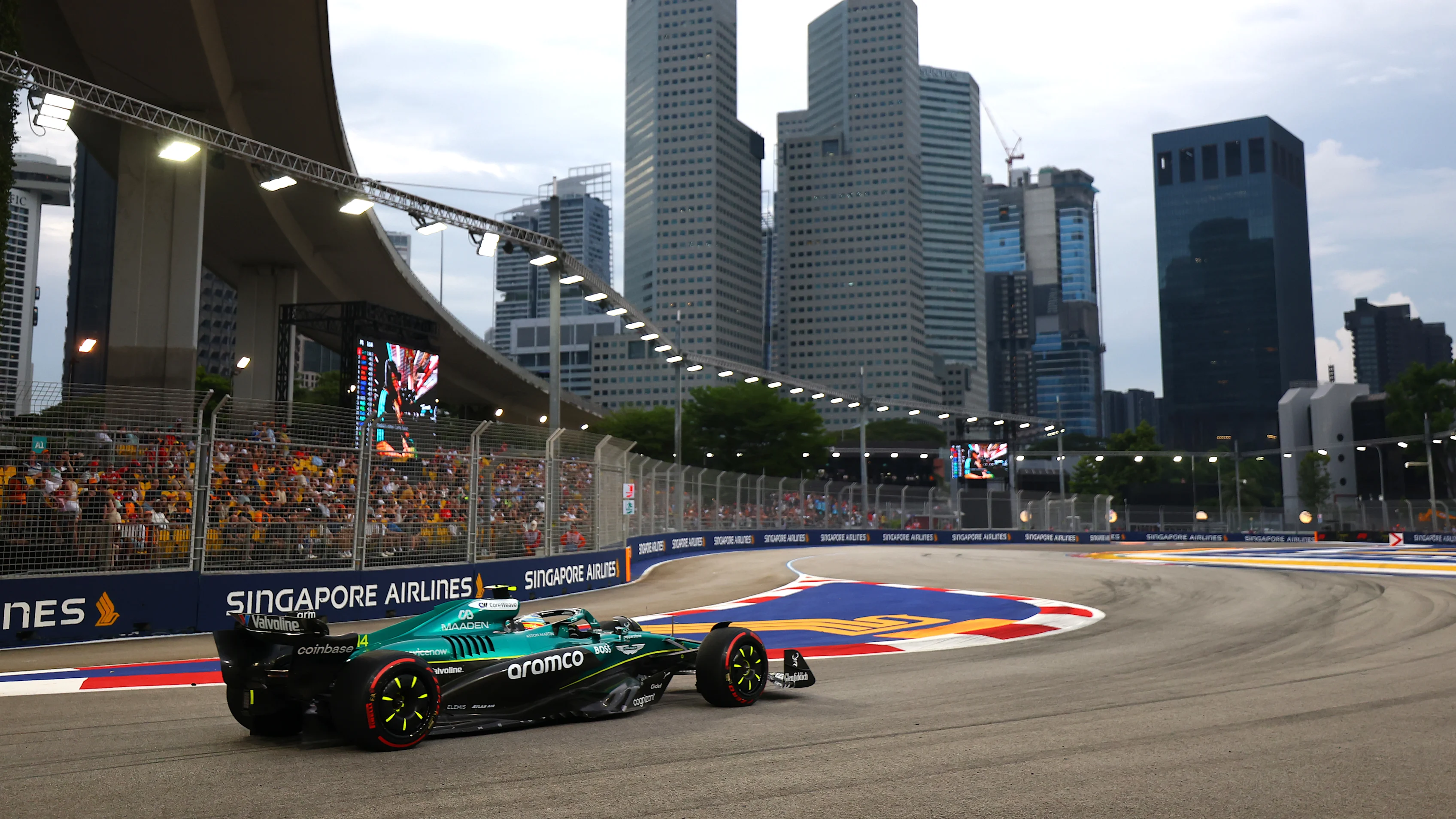 SINGAPORE, SINGAPORE - OCTOBER 03: Fernando Alonso of Spain driving the (14) Aston Martin F1 Team AMR25 Mercedes on track during practice ahead of the F1 Grand Prix of Singapore at Marina Bay Street Circuit on October 03, 2025 in Singapore, Singapore. (Photo by Bryn Lennon/Getty Images)