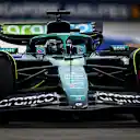 SINGAPORE, SINGAPORE - OCTOBER 03: Lance Stroll of Canada driving the (18) Aston Martin F1 Team AMR25 Mercedes on track during practice ahead of the F1 Grand Prix of Singapore at Marina Bay Street Circuit on October 03, 2025 in Singapore, Singapore. (Photo by Clive Mason/Getty Images)