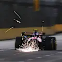 SINGAPORE, SINGAPORE - OCTOBER 03: Sparks fly behind Franco Colapinto of Argentina driving the (43) Alpine F1 A525 Renault on track during practice ahead of the F1 Grand Prix of Singapore at Marina Bay Street Circuit on October 03, 2025 in Singapore, Singapore. (Photo by Mark Thompson/Getty Images)