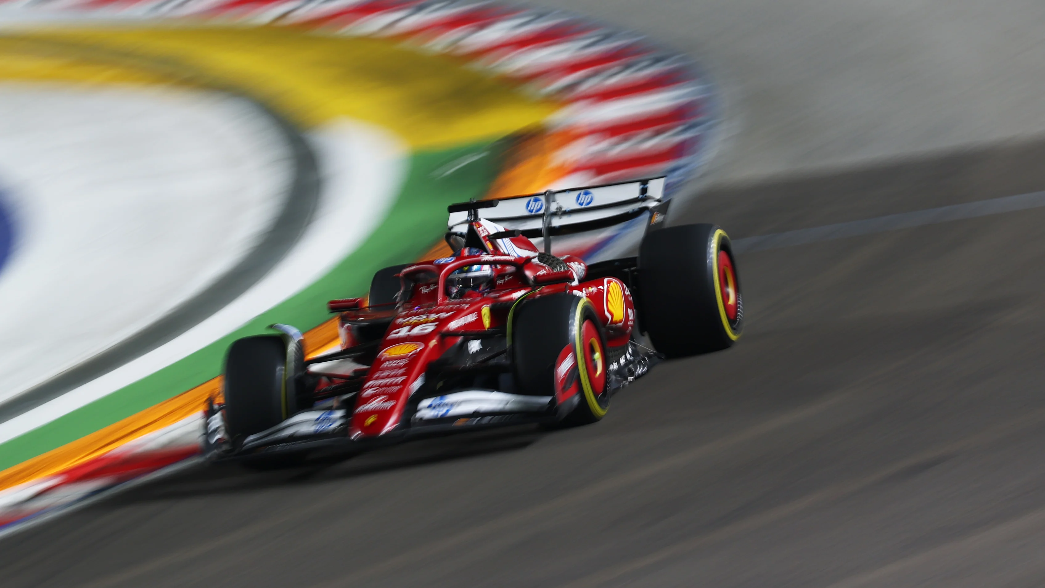 SINGAPORE, SINGAPORE - OCTOBER 05: Charles Leclerc of Monaco driving the (16) Scuderia Ferrari SF-25 on track during to the F1 Grand Prix of Singapore at Marina Bay Street Circuit on October 05, 2025 in Singapore, Singapore. (Photo by Mark Thompson/Getty Images)