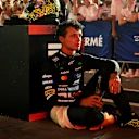 SINGAPORE, SINGAPORE - OCTOBER 05: Third placed Lando Norris of Great Britain and McLaren cools down in parc ferme during the F1 Grand Prix of Singapore at Marina Bay Street Circuit on October 05, 2025 in Singapore, Singapore. (Photo by Mark Sutton - Formula 1/Formula 1 via Getty Images)
