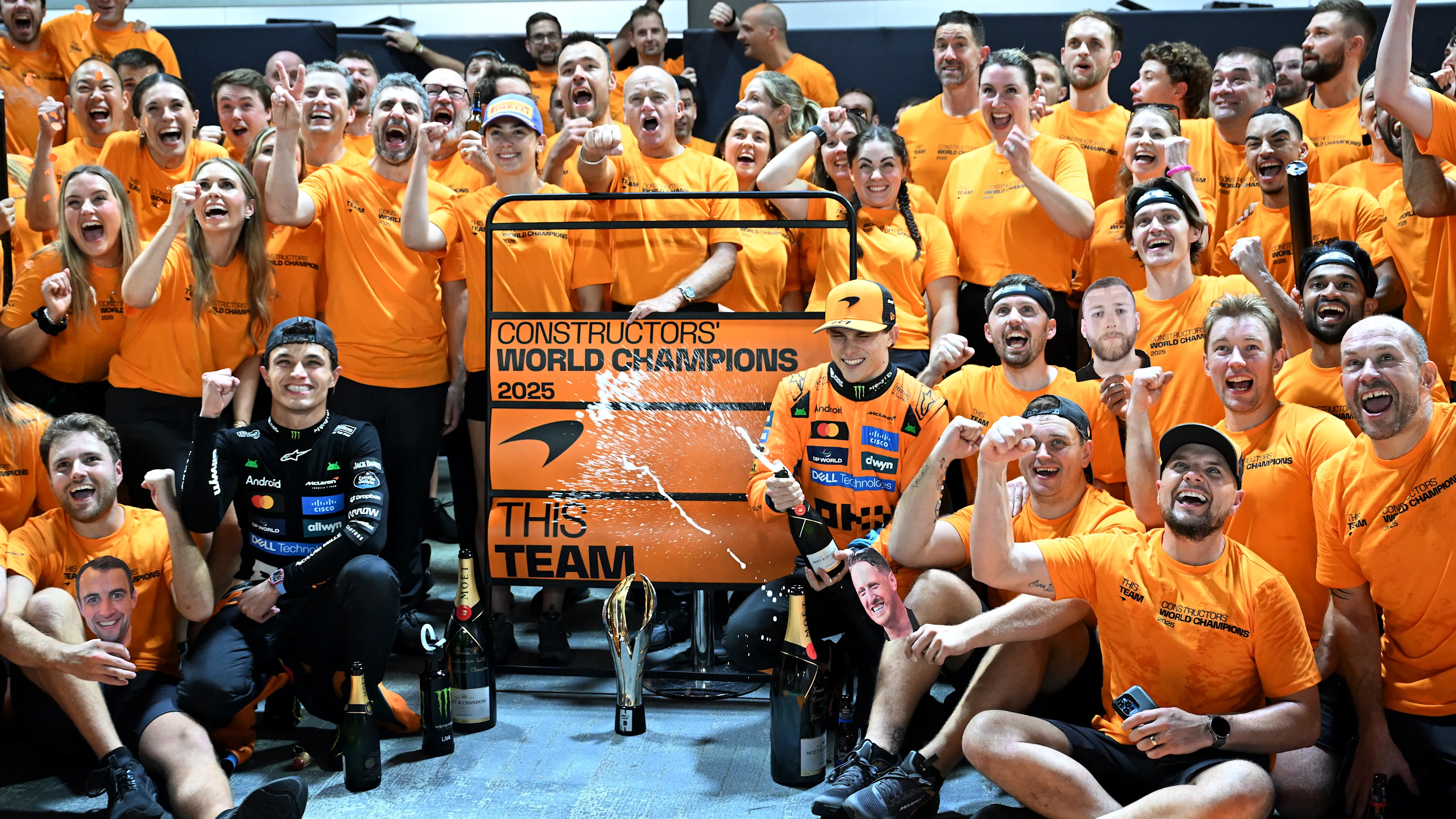 SINGAPORE, SINGAPORE - OCTOBER 05: Lando Norris of Great Britain and McLaren Oscar Piastri of