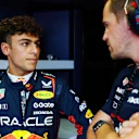 MEXICO CITY, MEXICO - OCTOBER 24: Arvid Lindblad of Great Britain and Oracle Red Bull Racing talks in the garage during practice ahead of the F1 Grand Prix of Mexico at Autodromo Hermanos Rodriguez on October 24, 2025 in Mexico City, Mexico. (Photo by Mark Thompson/Getty Images)