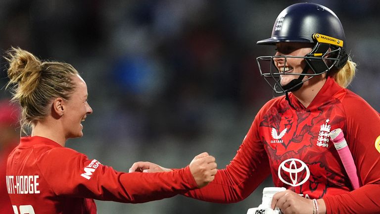Danni Wyatt-Hodge and Sophie Ecclestone celebrate England's thrilling final-ball win over India in the fifth T20I at Edgbaston