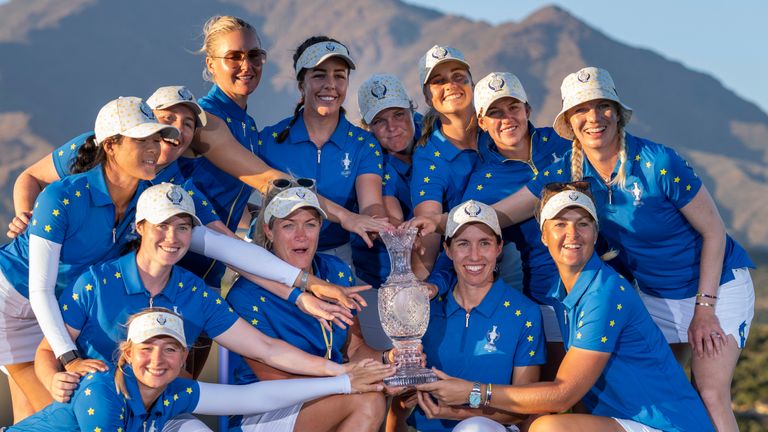 Europe's team pose with the trophy after winning the Solheim Cup golf tournament in Finca Cortesin, 